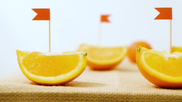 The concept of healthy food. Orange, vitamin C. boat in the form of an orange. Marine theme in food