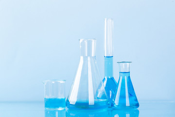 research studies on the search for vaccines, laboratory glassware, equipment, tests.