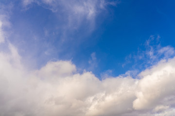 Naklejka na ściany i meble blue sky with beautiful contrasting clouds