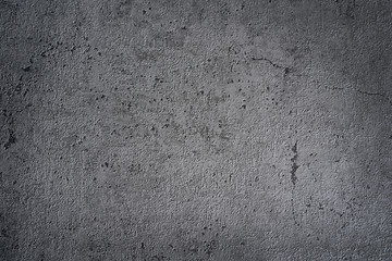 Сoncrete grey wall covered with gray cement texture as background can be used in design. 