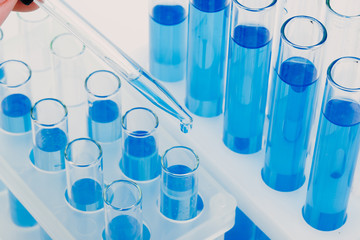 A pipette that adds fluid to one of several tubes. Lab tests