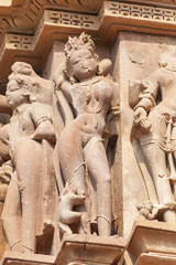 Stone carved erotic bas-relief Sculpture of love making in Kandariya Mahadeva Temple, Group of Monuments, India