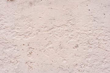 Texture of a concrete wall with cracks and scratches which can be used as a background