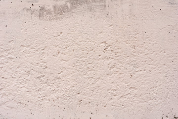 Texture of a concrete wall with cracks and scratches which can be used as a background