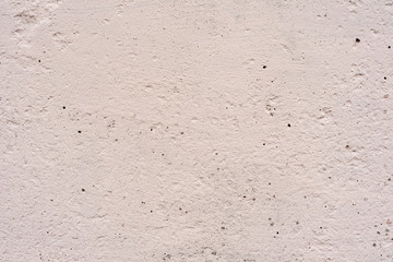 Texture of a concrete wall with cracks and scratches which can be used as a background