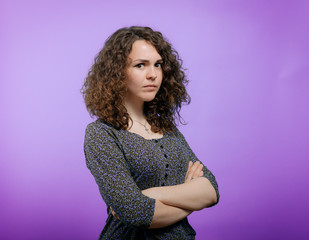 Portrait of a woman arms folded