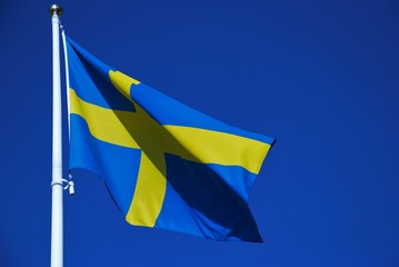 Sweden waving flag on blue sky background