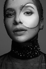 beautiful girl in mask. Beautiful Woman in Net on her Face