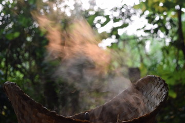 The image blurre of the steam  floating from steaming and sunlight passing through