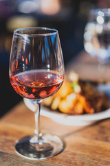 glass of wine with food