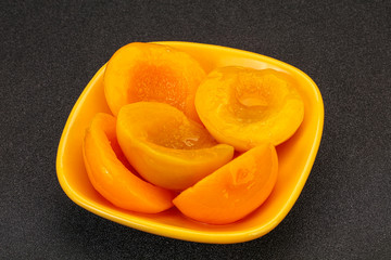 Marinated peaches fruit in the bowl
