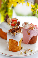 appetizing Easter cake decorated with nuts chocolate and fruit. Easter
