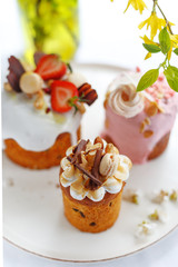 appetizing Easter cake decorated with nuts chocolate and fruit. Easter