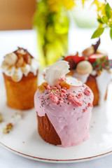 appetizing Easter cake decorated with nuts chocolate and fruit. Easter