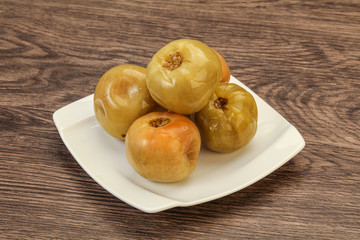 Pickled green tomato in the bowl