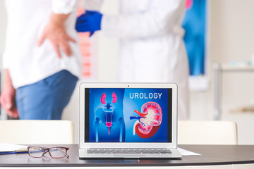 Modern laptop on table in urologist's office