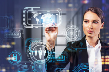 Businesswoman working with GUI in office