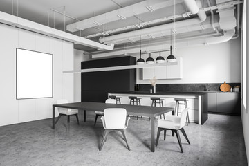 White and gray kitchen corner, table and poster