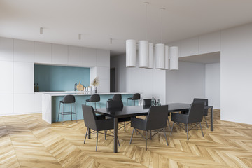 Bar and table in white and blue kitchen