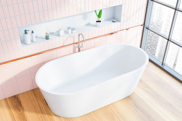 Pink tile bathroom with white tub, top view