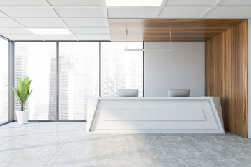 Fototapeta na wymiar Reception desk in white and wooden office