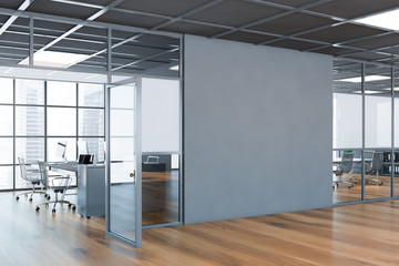 Gray office corridor with mock up wall