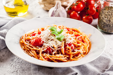Spaghetti Napoli with parmesan cheese - 335744313