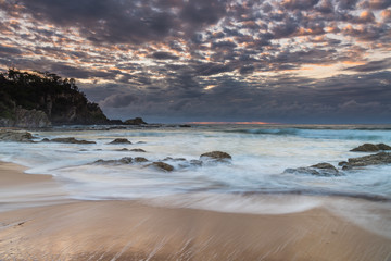 Fototapeta premium Clouds and Surf - Sunrise at Malua Bay