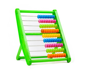 Simple colorful classic abacus toy isolated on white, cut out, beads aligned. Teaching aids, accessories. Kids, children math, fun arithmetic education, learning mathematics symbol abstract concept