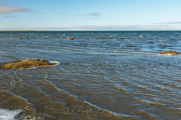 Lake Kamyslybas, large saltwater lake in the Kyzylorda Region of Kazakhstan. waves on the surface of the lake.