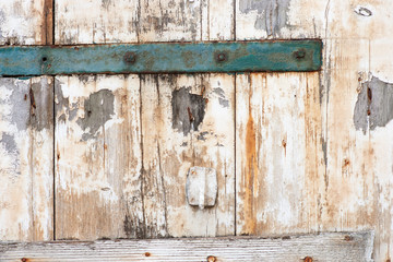 Old white wooden door background closeup