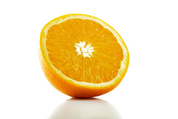 fresh orange fruit half isolated on white
