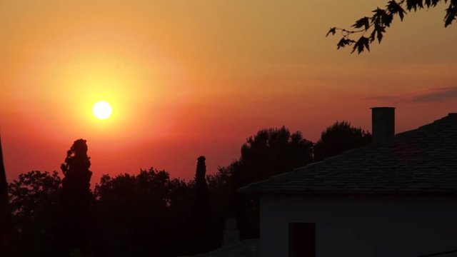 greece pelio portaria traditional house chimney trees sunset volos