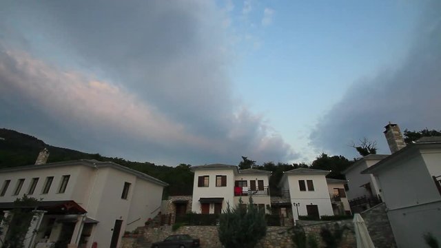 greece pelio portaria traditional resort clouds timelapse  chimney trees sunset volos