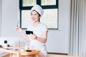 Asian young woman makeup at home