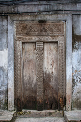Fototapeta na wymiar Old Wooden Door in Zanzibar