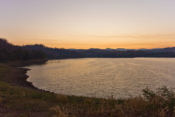 Obraz premium Sunrise over a Reservoir at Mae Sot, Thailand, Asia