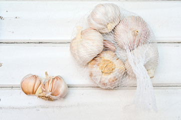 Clove of garlic on wooden counter
