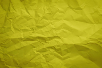 Crumple yellow paper texture use a background.