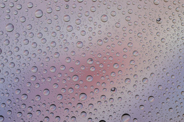 Drops water on glass. Wet rain pattern texture background.