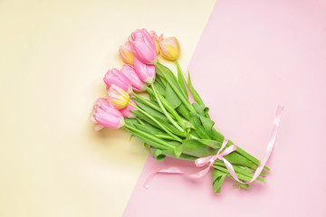 Bouquet of beautiful flowers on color background