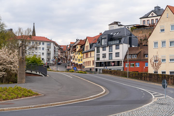 Fototapeta na wymiar 03.04.2020. Town Aschaffenburg, northwest Bavaria, Germany. Street with colorful houses of the old city at summer day. Tourist attraction. Concept of travel, tourism
