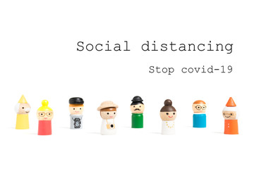 Stop COVID-19 Social distancing text with miniature people on white background