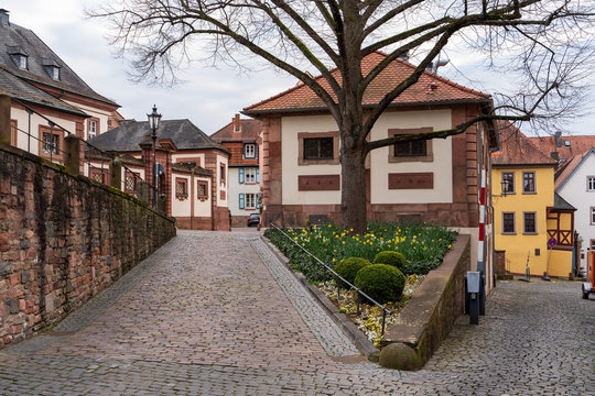 03.04.2020. Town Aschaffenburg, northwest Bavaria, Germany. Street with colorful houses of the old city at summer day. Tourist attraction. Concept of travel, tourism