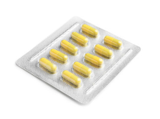 Blister pack with pills on white background