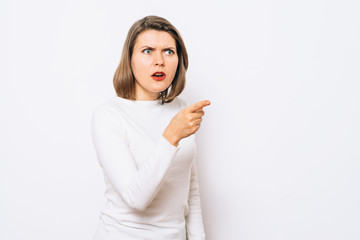 girl points to someone the finger