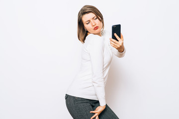 Fototapeta premium Woman taking selfie