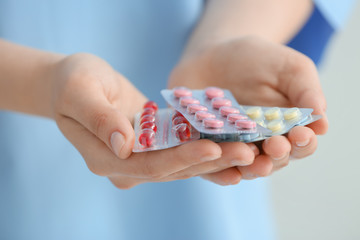 Female doctor with pills, closeup