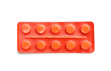 Blister pack with pills on white background
