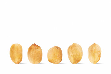 Dried raw peanuts isolated on white background